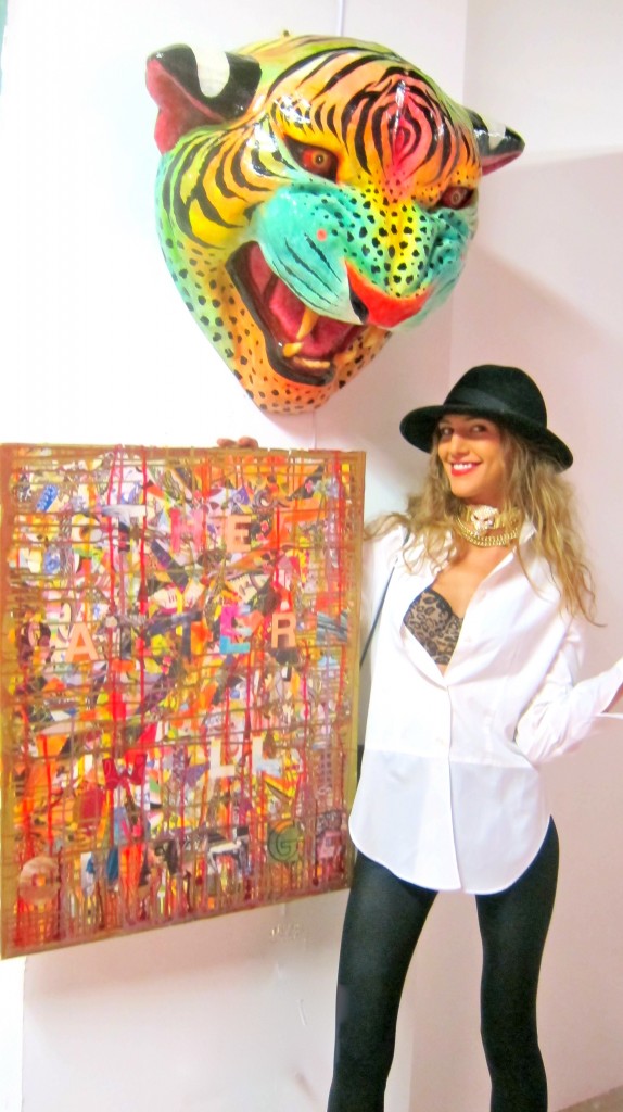 Proudly Posing with my piece that was exhibited and contributed to this years event. The second annual "Haiti Art Expo" that took place in Miami's Design District at the historic Moore Building, During this years famed miami art fair, Art Basel.